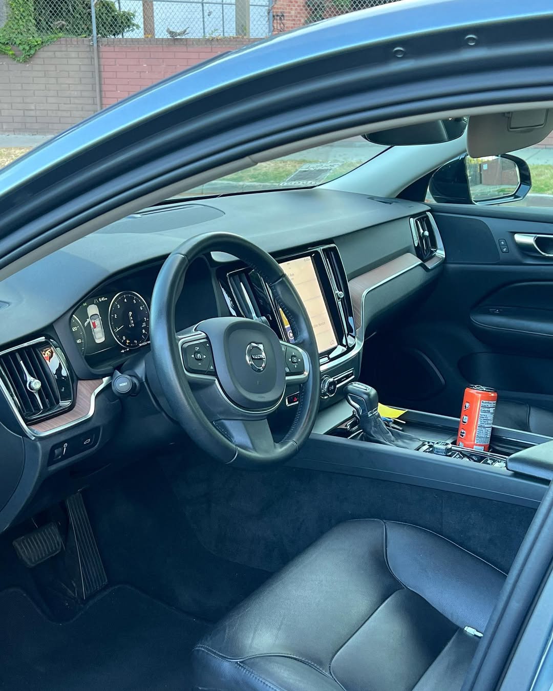 Interior car detail with clean seats, dashboard, and trim